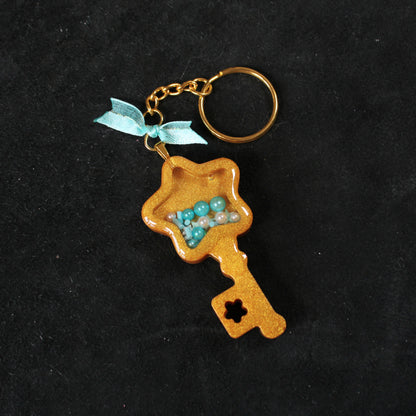 Golden Key Shaker Charm