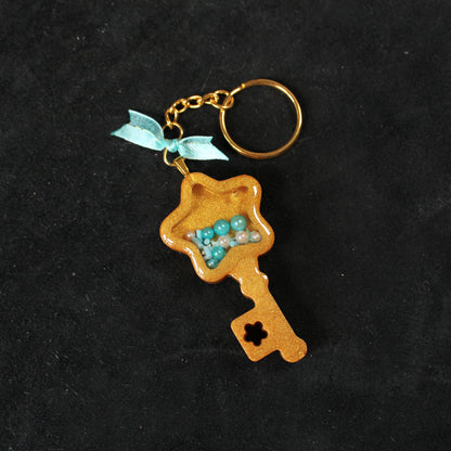 Golden Key Shaker Charm