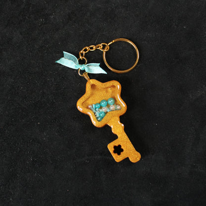 Golden Key Shaker Charm