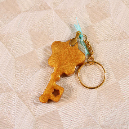 Golden Key Shaker Charm
